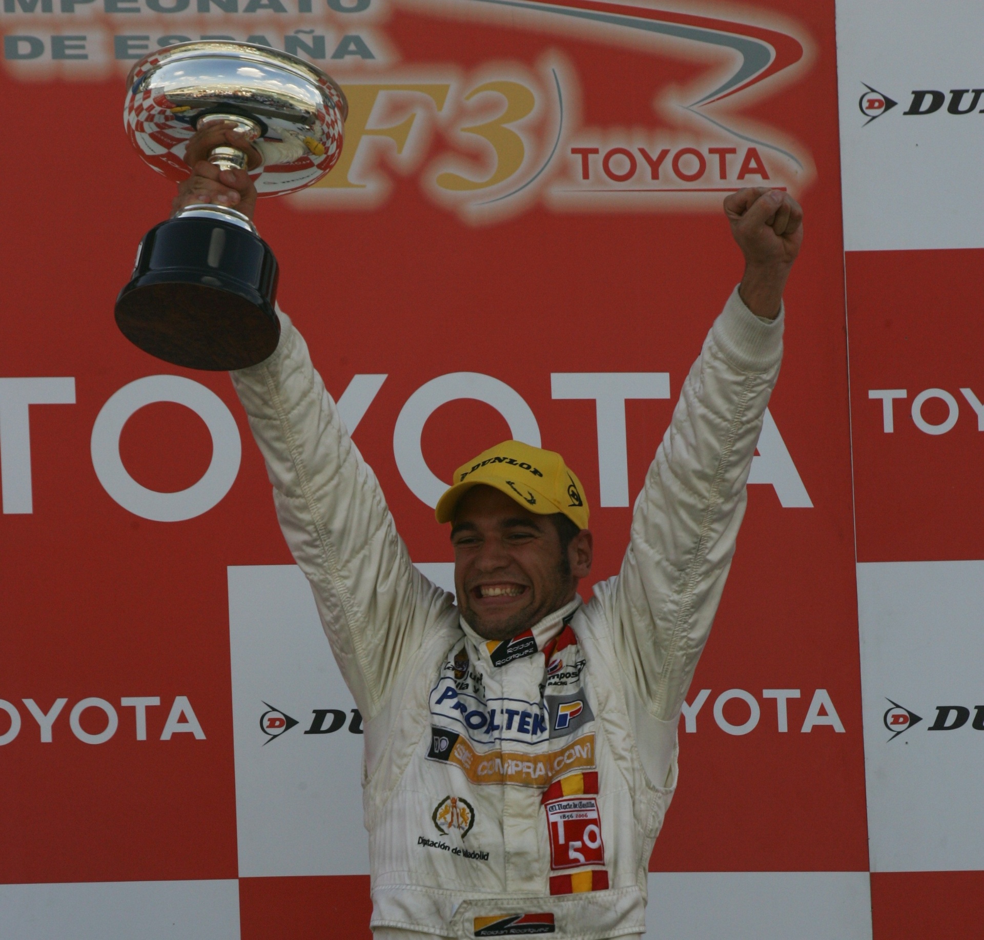 Roldán Rodríguez lifting a trophy on the Spanish Formula 3 Toyota Championship podium
