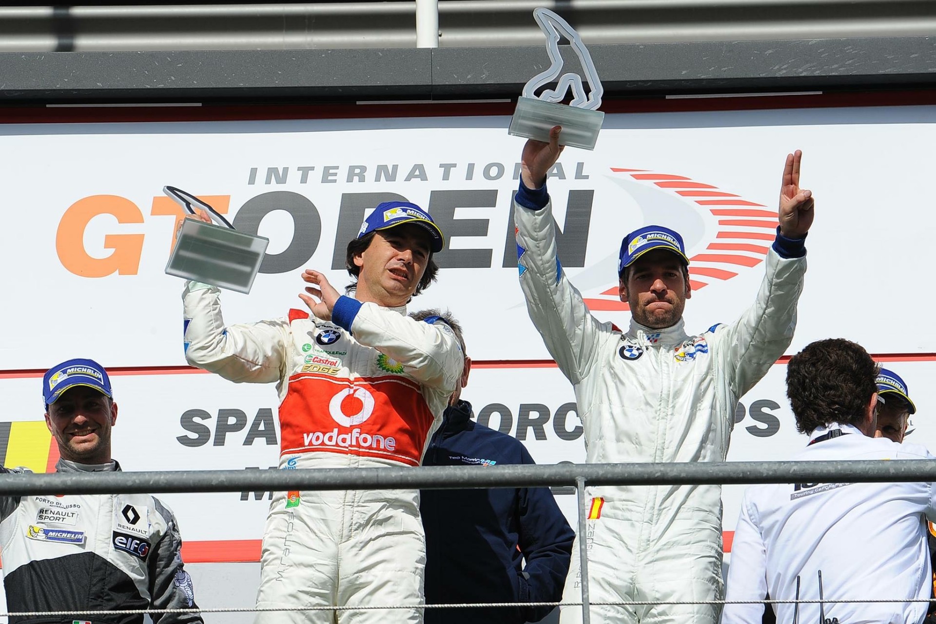 Roldán Rodríguez celebrating an International GT Open podium at Spa-Francorchamps in BMW overalls